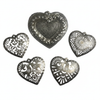Assorted Small Hearts Set of 4 - Haitian metal art heart ornaments on white background